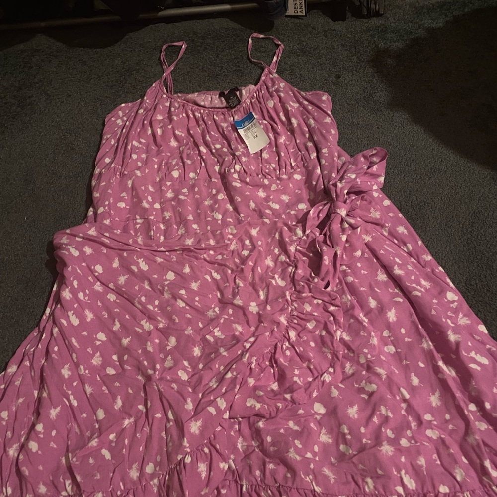 NEW WITH TAG, floral light purple/pink with white flowers. Wrap dress